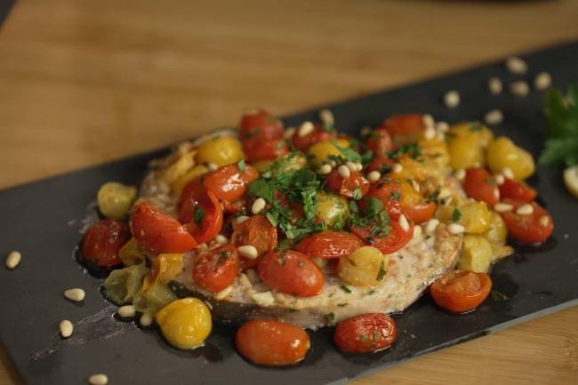 Swordfish fillet with pine nuts and cherry tomatoes in air fryer