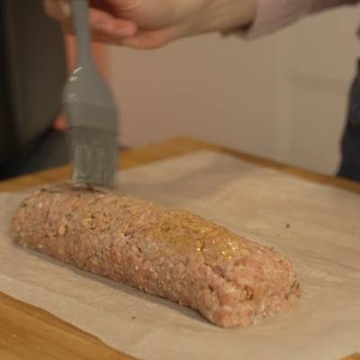 form the meatloaf roll and add olive oil